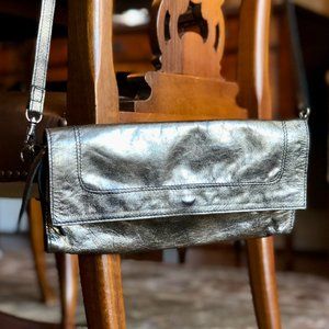 Latico purse with detachable over the shoulder strap, metallic silver leather